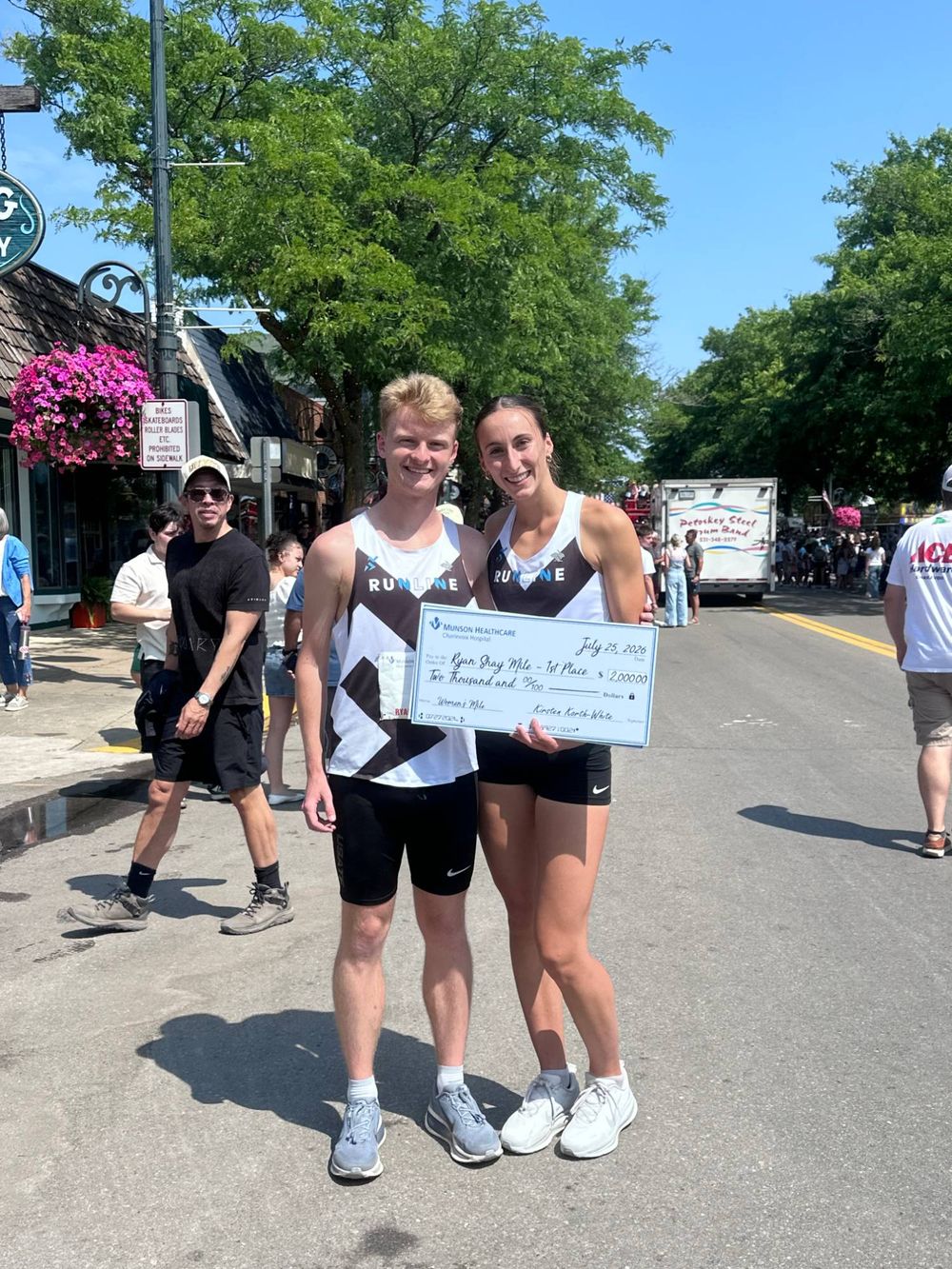 Two Runline athletes celebrating a race win